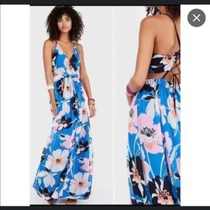 Gorgeous NWT size XL dress. From Express. Side cut outs. Vibrant colors.
